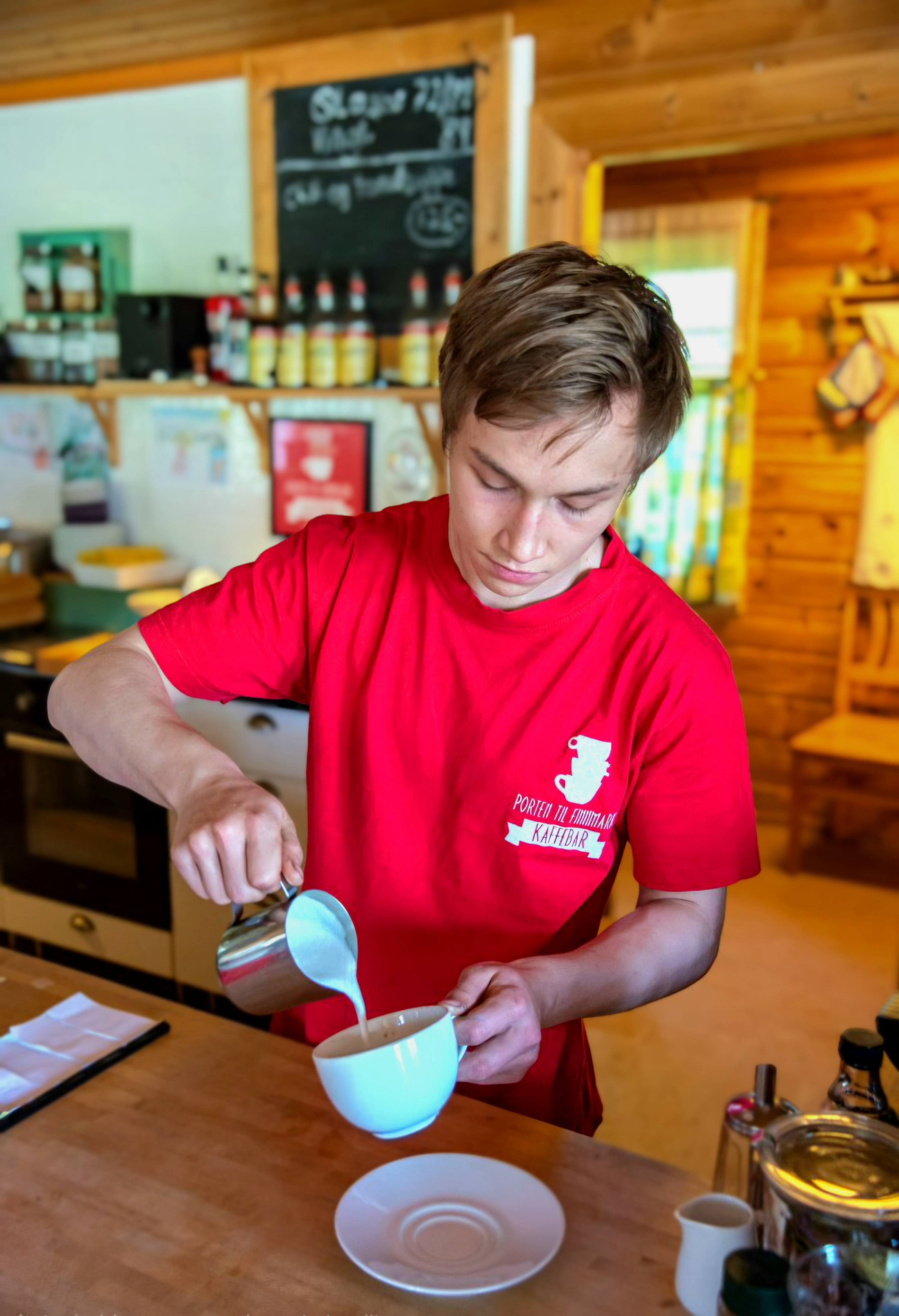 Henrik pours a cup of coffee